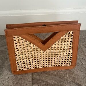 Leather and rattan clutch bag